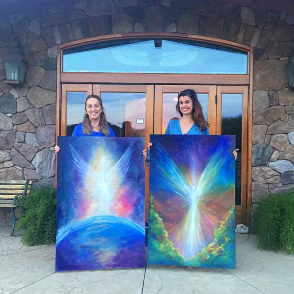 Lucinda with angel paintings